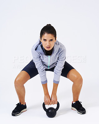 Buy stock photo Exercise, kettlebell and woman with fitness, portrait and training on white studio background. Person, model and athlete with equipment, wellness and balance with workout, strength and stretching