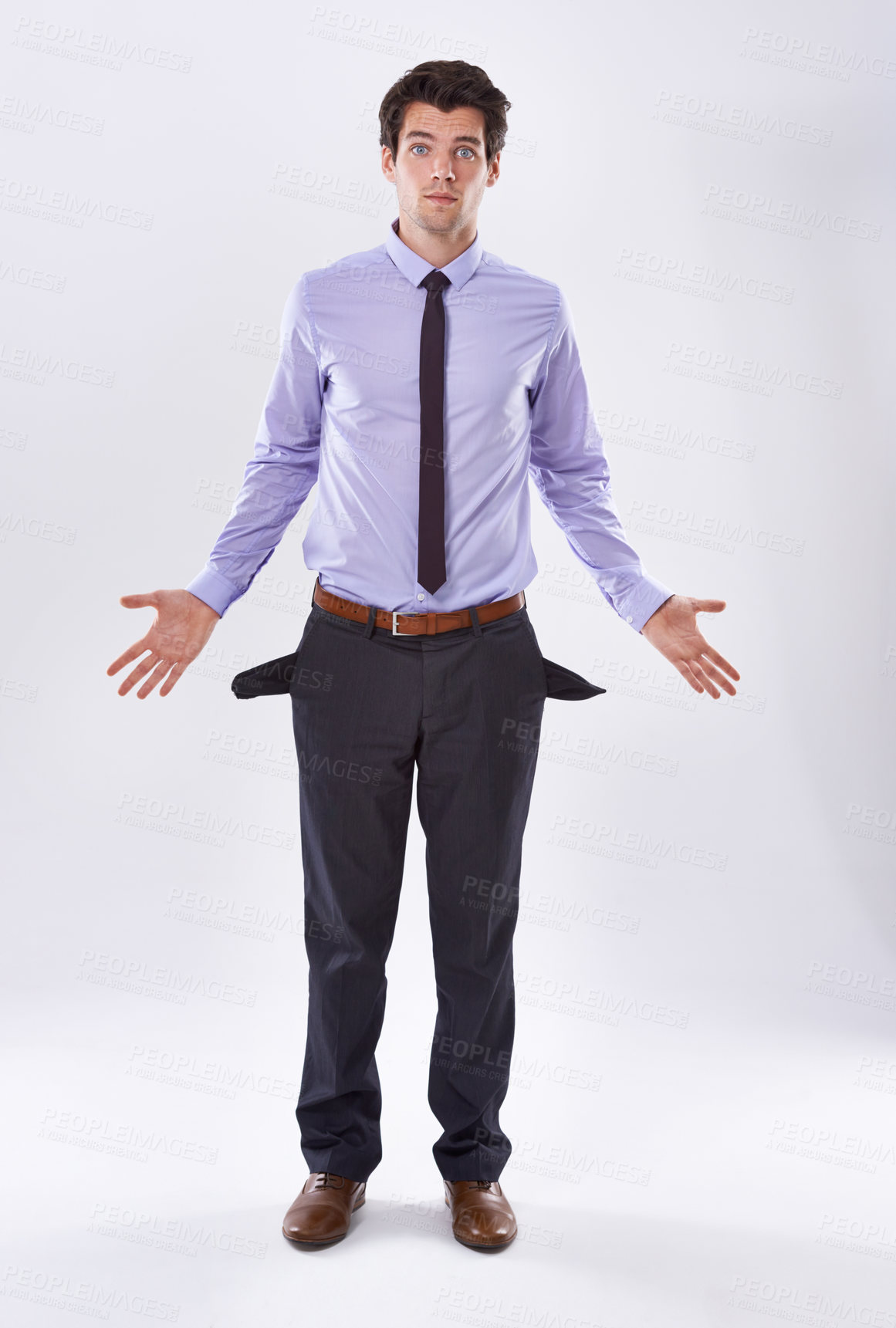 Buy stock photo Portrait, poor and businessman with empty pockets for bankruptcy, debt or inflation. Poverty, broke worker and financial crisis, economic depression or unemployed isolated on white studio background