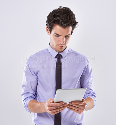 Buy stock photo Tablet, research and business man in studio scroll for online planning, website review and social media. White background, corporate and worker on digital technology for email, internet or networking