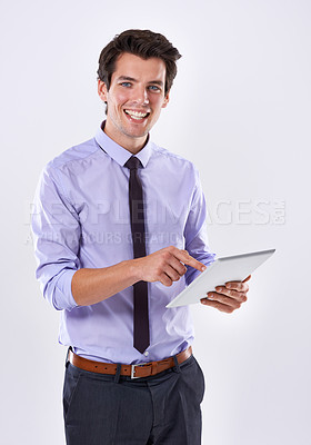 Buy stock photo Tablet, portrait and businessman smile for research online, website review and social media in studio. White background, corporate and worker on digital technology for email, internet or networking