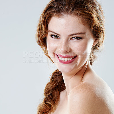 Buy stock photo Woman, portrait and cosmetics in studio for makeup, application and beauty transformation with lipstick. Model, face and happy on white background for texture, aesthetic and facial change in England