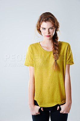 Buy stock photo Awkward, teenager and portrait of girl in studio for social anxiety, peer pressure and identity. Youth, student and embarrassed with person on white background for gen z attitude and self esteem