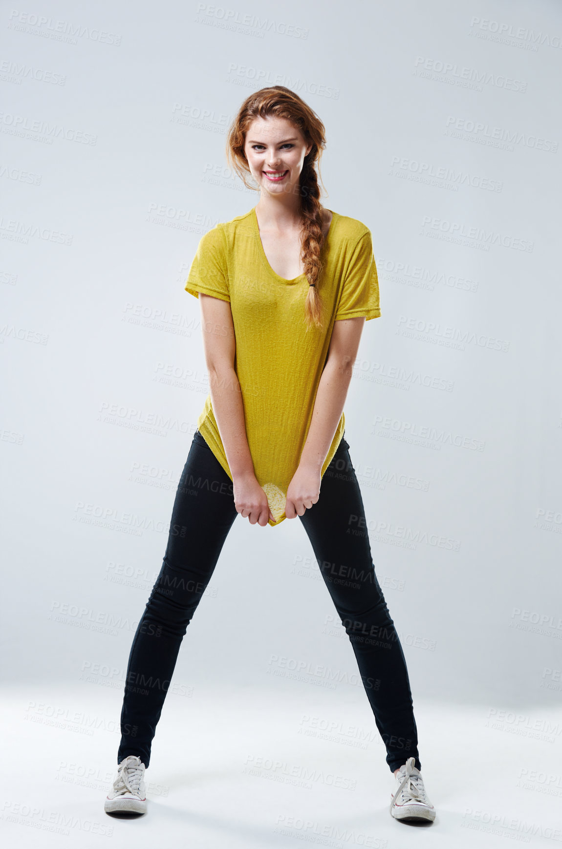 Buy stock photo Smile, woman and portrait for fashion in studio with tshirt, trendy outfit and natural beauty of cosmetic glow. Girl, stretching and casual clothes for university, makeup or pride on white background