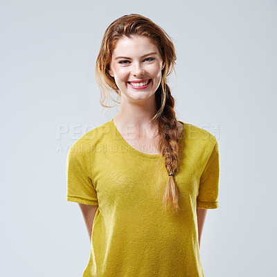 Buy stock photo Woman, smile and trendy fashion with tshirt, casual outfit and natural beauty of cosmetic glow in studio. Girl, portrait and stylish clothes with aesthetic, pride and woman on white background