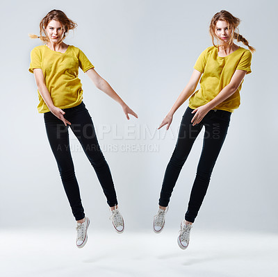 Buy stock photo Fashion, jump and portrait of woman with composite effect, style and cool clothes with sneakers. Young model, white background and female person floating in studio with body in air or youth culture