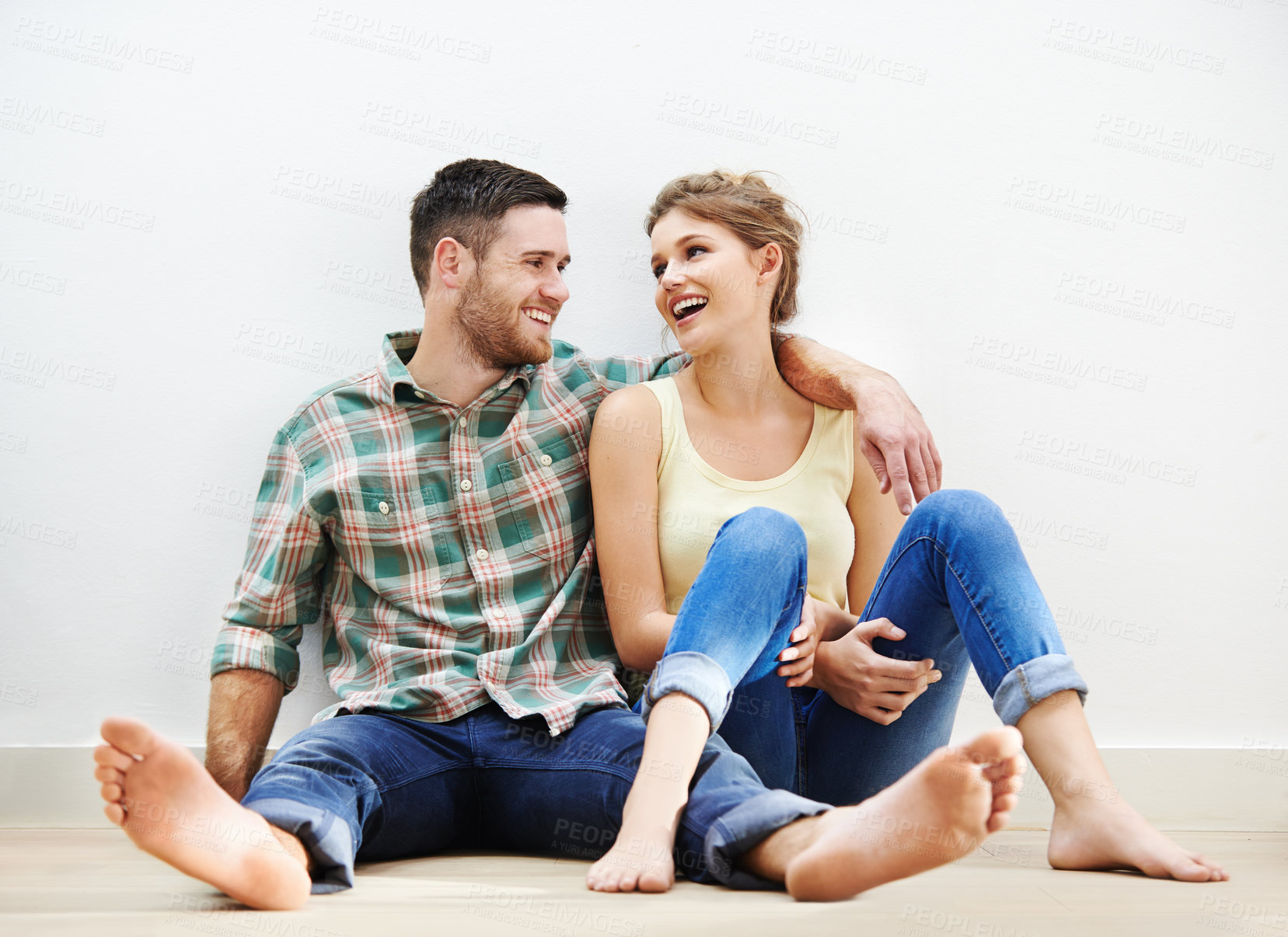 Buy stock photo Couple, happy and relax in house on floor for conversation, bonding and love together with romance. Man, woman and embrace on apartment ground for talking, relationship and chill on weekend with hug