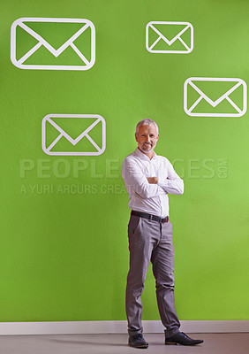Buy stock photo Business man, smile and email icon in office for communication, message and marketing campaign. Manager, mature and envelopes in workplace for networking, newspaper and customer service with portrait