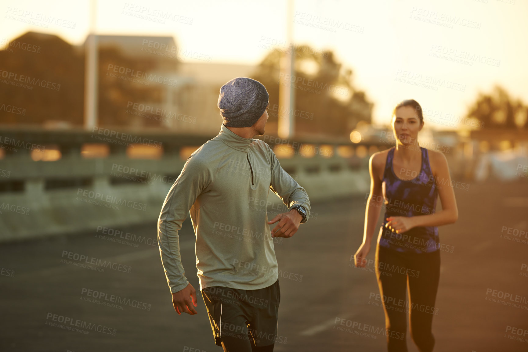 Buy stock photo Couple, fitness and running with partner on street in city for workout, training or outdoor exercise together. Man, woman or runners in cardio on asphalt or road for health or wellness in urban town