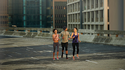 Buy stock photo Portrait, friends and running on road for workout, endurance and burn calories with exercise as team. Mockup space, people or cardio fitness in city for wellness, health benefits or pace for training