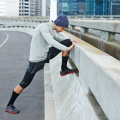 Buy stock photo Man, athlete and stretching on bridge for fitness with marathon training, cardio exercise and muscle growth. Active, male runner and warm up with workout performance, balance and sports challenge
