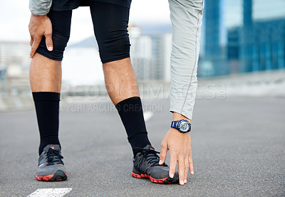 Buy stock photo Man, legs and stretching for fitness on road, bridge challenge and morning for cardio workout. Male person, warm up and urban town for muscle relief, outdoor street and athlete for start of training
