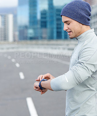 Buy stock photo Man, check and watch in city for fitness, heart rate and wellness app for tracking after exercise challenge. Road, male person or runner with smart clock for running time, training progress and pulse