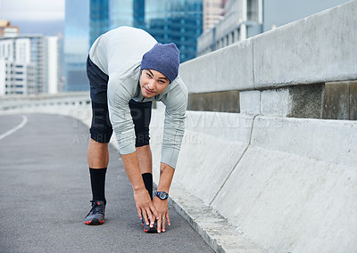 Buy stock photo Man portrait, city and stretching legs for exercise, bridge challenge and morning for cardio workout. Male person, warm up and urban town for muscle relief, outdoor and athlete for start of training