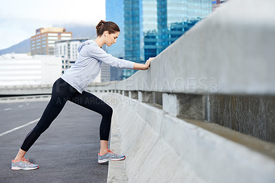 Buy stock photo Woman, city music and warm up for exercise, bridge challenge and earphones for cardio workout. Female person, stretching and urban town for muscle relief, outdoor and athlete for start of training