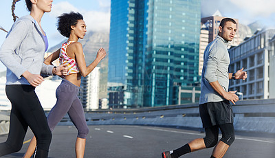 Buy stock photo Running, workout and fitness with friends in city for start of training, coaching and wellness. Race, exercise and marathon cardio with people for personal trainer, health and sports performance