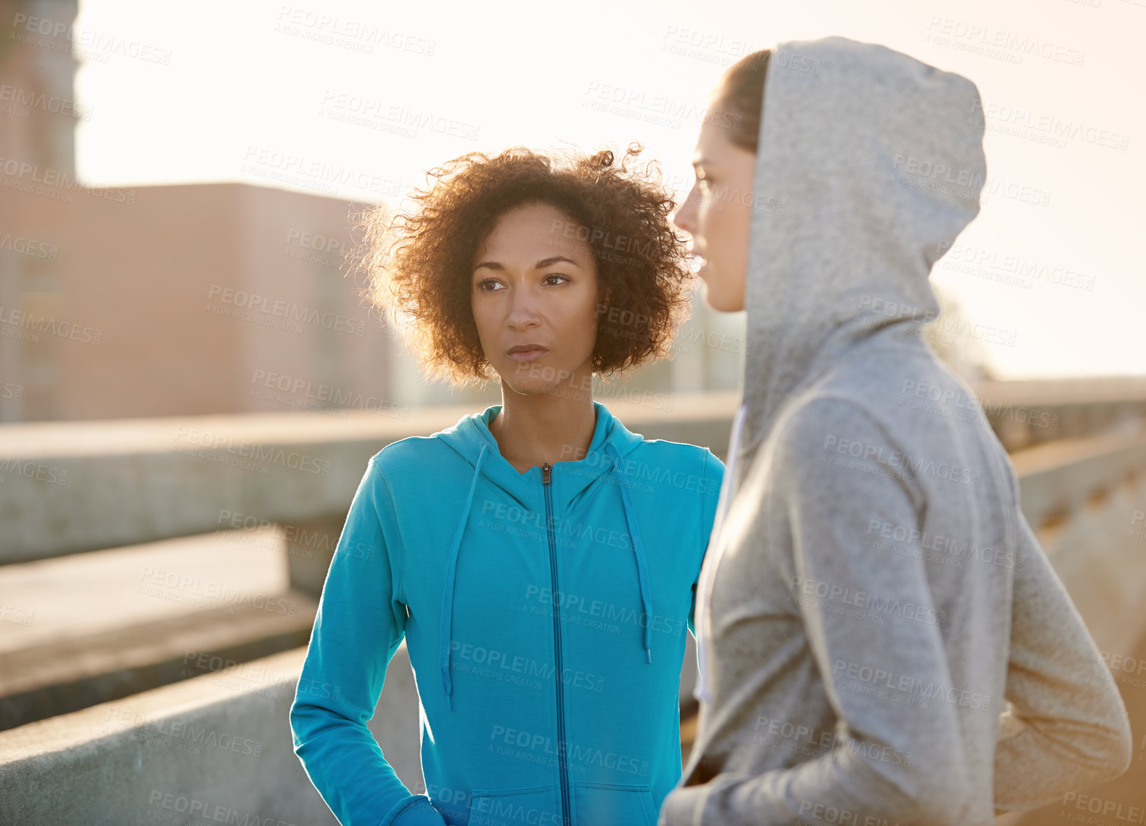 Buy stock photo Runner, women and together in city at sunrise, bridge or thinking for fitness, training and break in morning. People, direction and start workout in city for exercise, team and ready for marathon