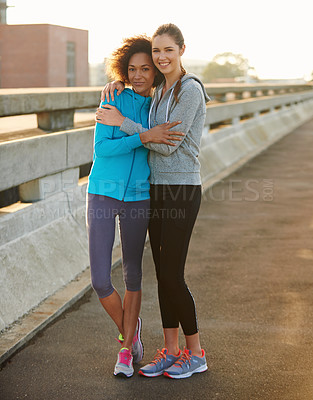 Buy stock photo Friends, portrait and support in city for fitness, exercise and running session for marathon challenge outdoor. Bridge, people and women with hug for wellness goals, hug and bonding in road by space
