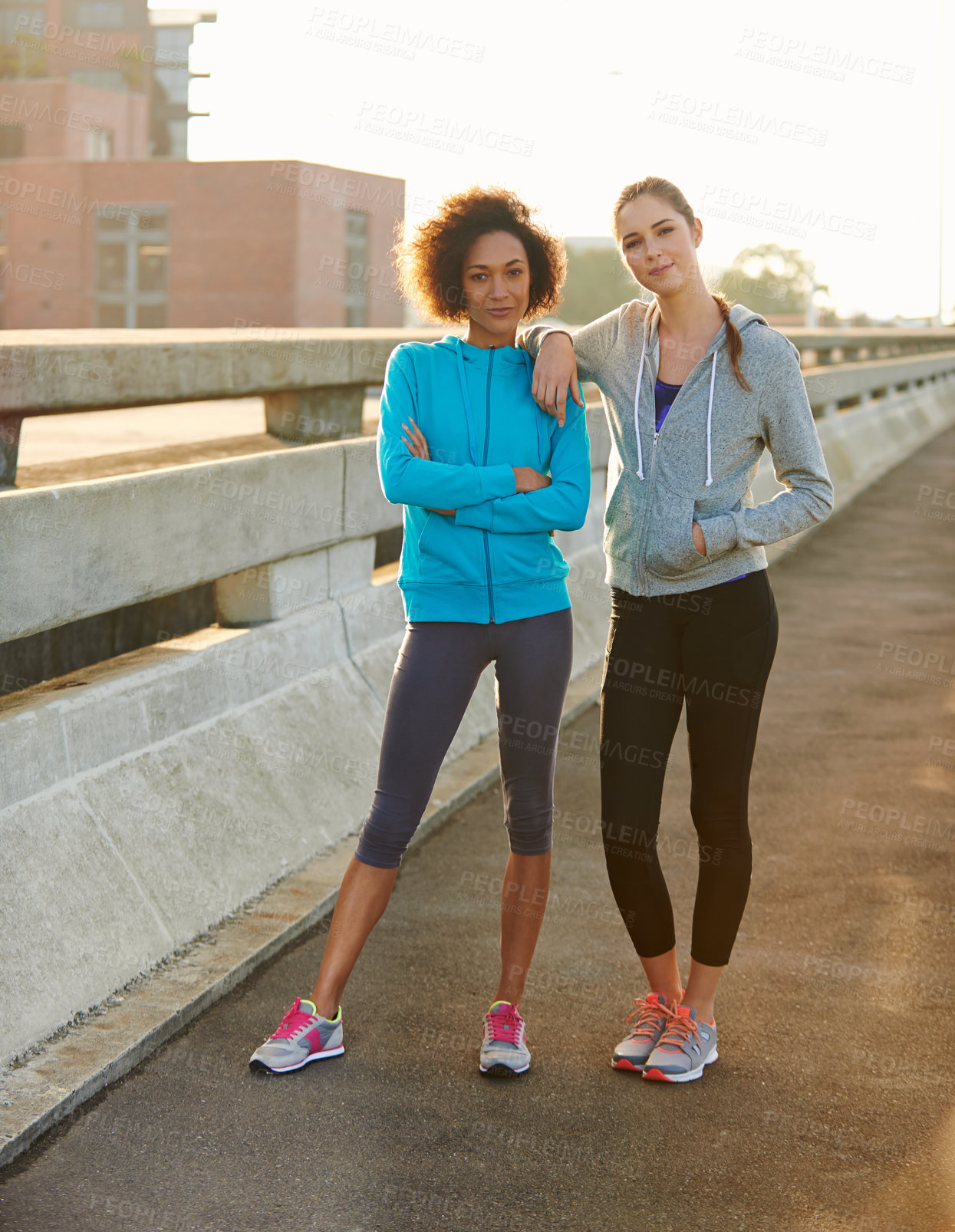 Buy stock photo Fitness, portrait and women with confidence in city for workout, training or outdoor exercise together. Young, female person or runners with smile or arms crossed for run or cardio in an urban town