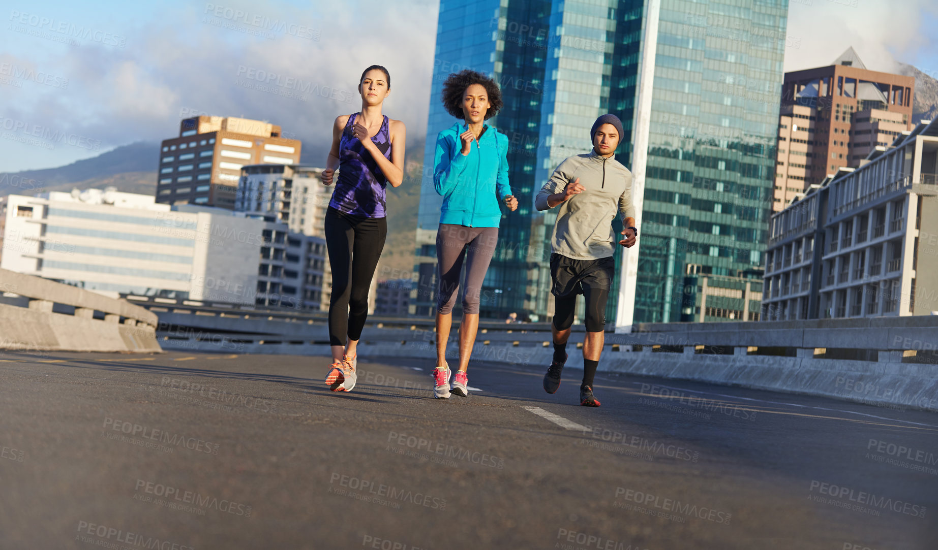 Buy stock photo City, road and friends running together for fitness, training or commitment to healthy body. Morning, exercise and group of people on street for urban workout, outdoor challenge or sports performance