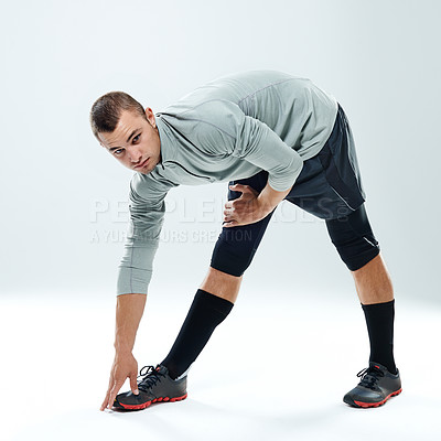 Buy stock photo Portrait, stretching and man with fitness, training and athlete on white studio background. Face, person and model with exercise, workout and challenge with wellness, cardio and balance with health 