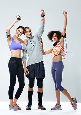 Buy stock photo Portrait of three friends feeling cheerful after a workout