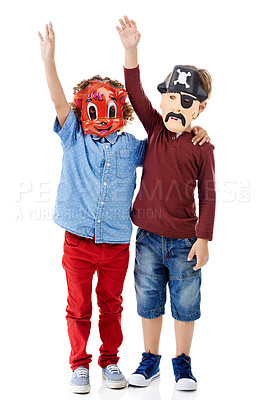 Buy stock photo Children, friends and mask in studio for halloween party with pirate, animal and wave by white background. Games, embrace and kids with hug for fantasy with character, fashion and hello at event