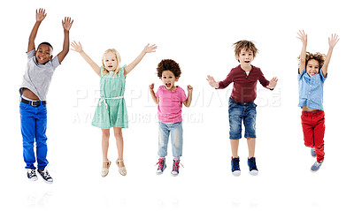 Buy stock photo Studio shot of a group of young friends jumping for joy against a white background