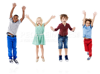 Buy stock photo Happy, jumping and portrait of children in studio for diversity, friends and playing. Happiness, youth and smile with group of kids isolated on white background for celebration, playful and energy