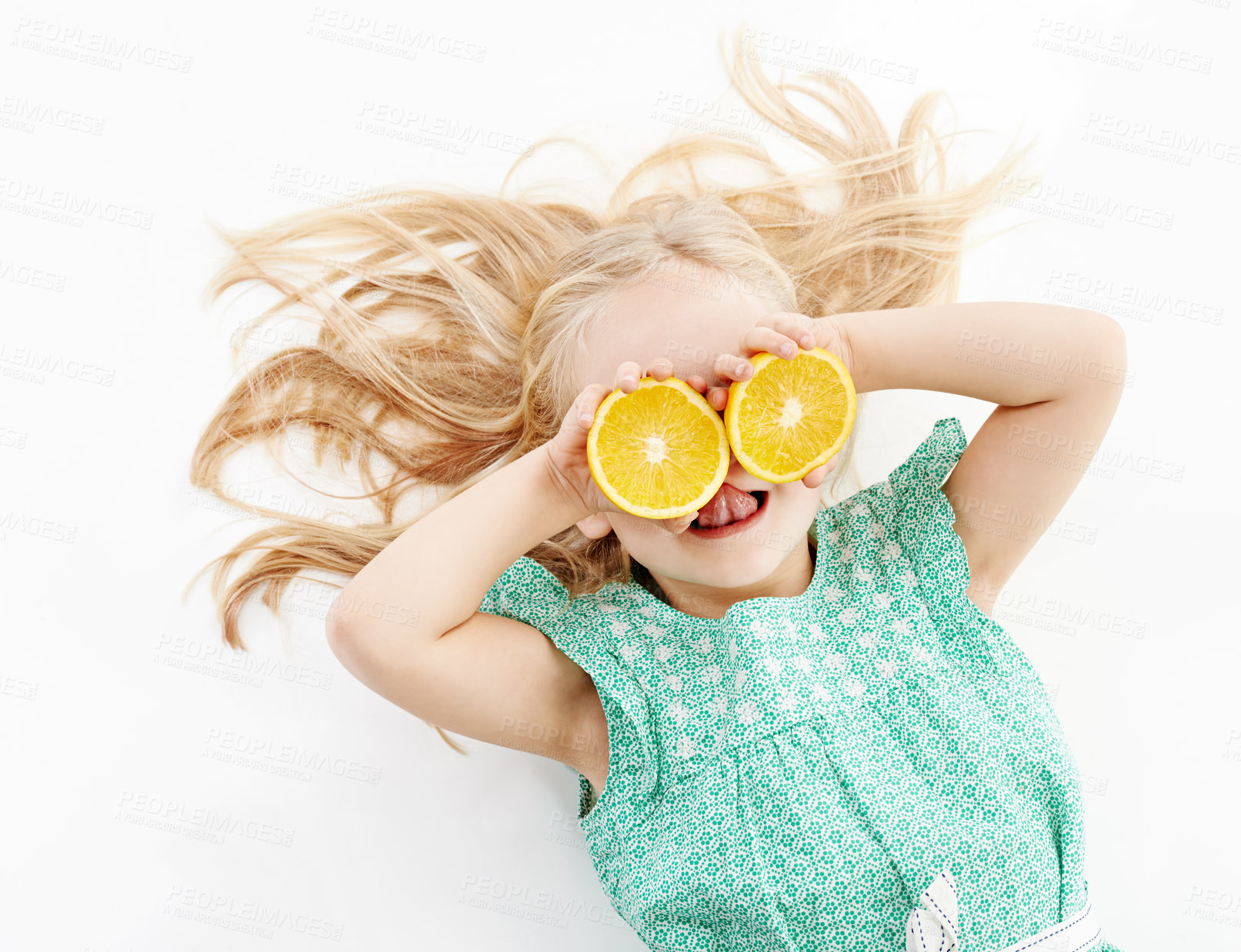 Buy stock photo Studio, fruit and child with orange for nutrition, health and vitamin c for wellness with lick. Relax, young girl and taste with citrus by white background for fiber, detox and wellbeing by above