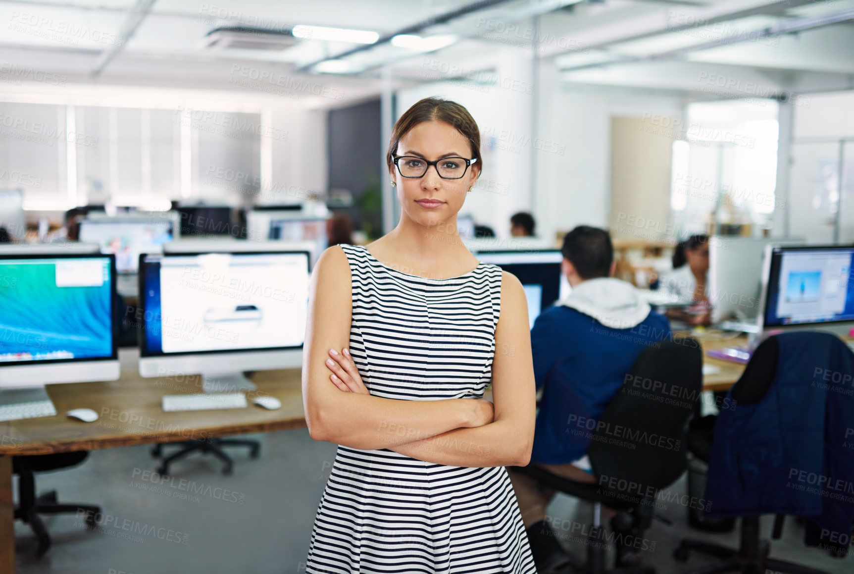 Buy stock photo Portrait, arms crossed and woman in office, serious and proud of startup, coworking and internship. Creative, graphic designer and girl with confidence, glasses and vision for screen of computer