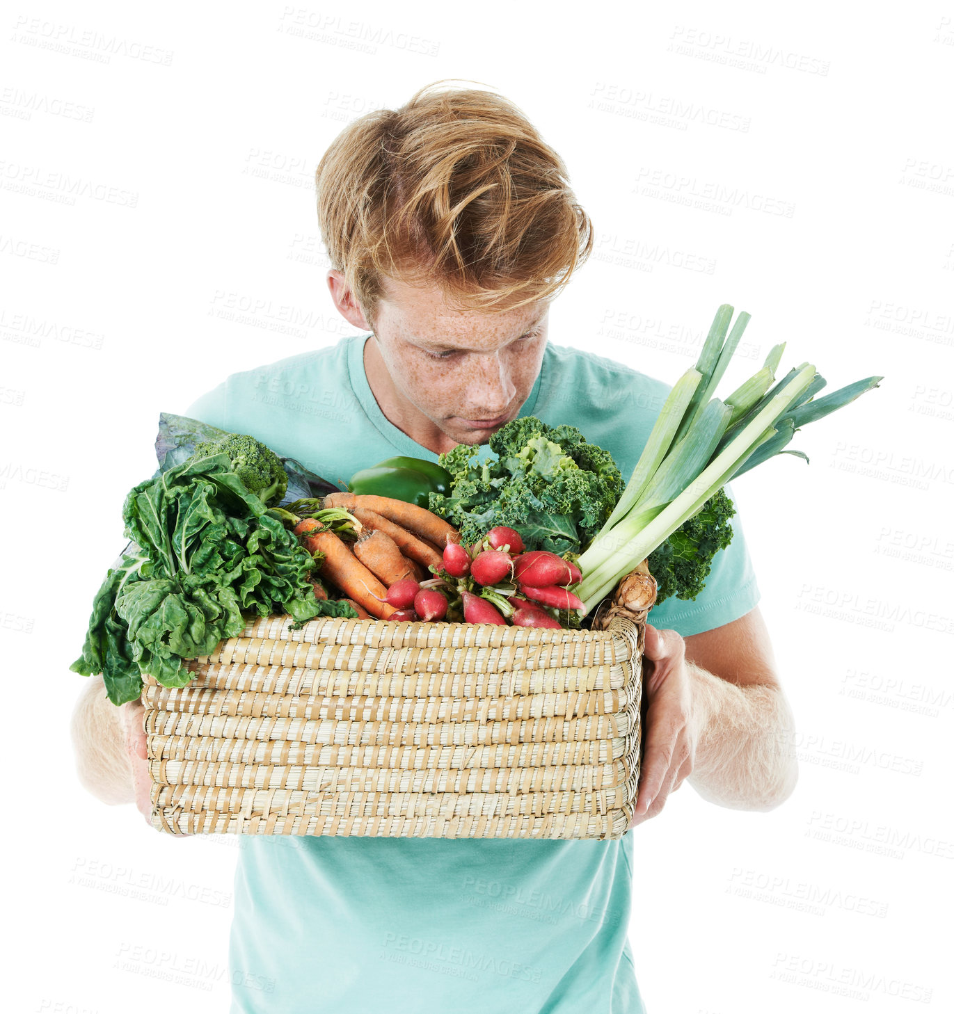 Buy stock photo Man, sniff vegetables and basket in studio, shopping and organic produce by white background. Person, thinking and container with groceries, nutrition or scent for vegan food with discount for diet