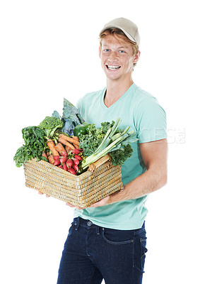 Buy stock photo Man, portrait or smile with vegetables in basket in studio for eco friendly small business or fresh produce. Mockup space, sustainability or happy person for healthy food supplier on white background