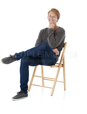 Buy stock photo Chair, laugh and portrait of man in studio with freckles, pride and positive attitude. Fashion, happy and isolated redhead person in trendy sweater, style and casual clothes on white background