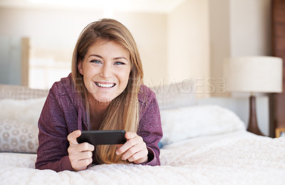 Buy stock photo Teenager, girl in portrait and smartphone with games and relax in bedroom, smile with technology and esports. Young female person at home, gaming and mobile app with happiness, gen z and internet