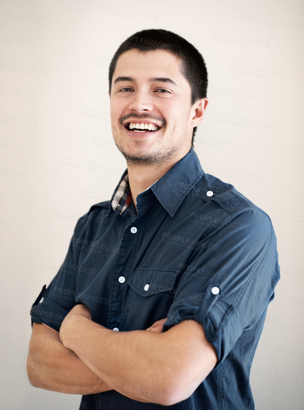 Buy stock photo Happy man, confident or portrait by wall in home to relax with pride, fashion or smile in Spain. Face, chill or proud male person with arms crossed for break, wellness or day off on white background