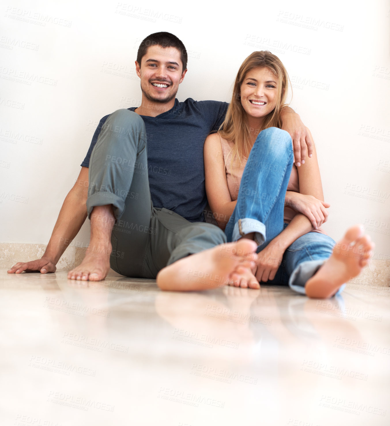 Buy stock photo Portrait, happy and couple on the ground, love and quality time with romance, happiness and relationship. Romantic, man or woman on the floor, relax and cheerful with hug, loving together and bonding