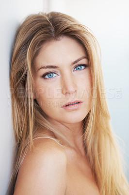 Buy stock photo Aesthetic, portrait and skincare with woman in studio for dermatology, natural cosmetics or wellness. Beauty, blue eyes and face of confident model on white background for collagen or cosmetology