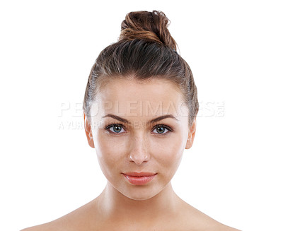 Buy stock photo Portrait of a beautiful young woman with perfect skin against a white background