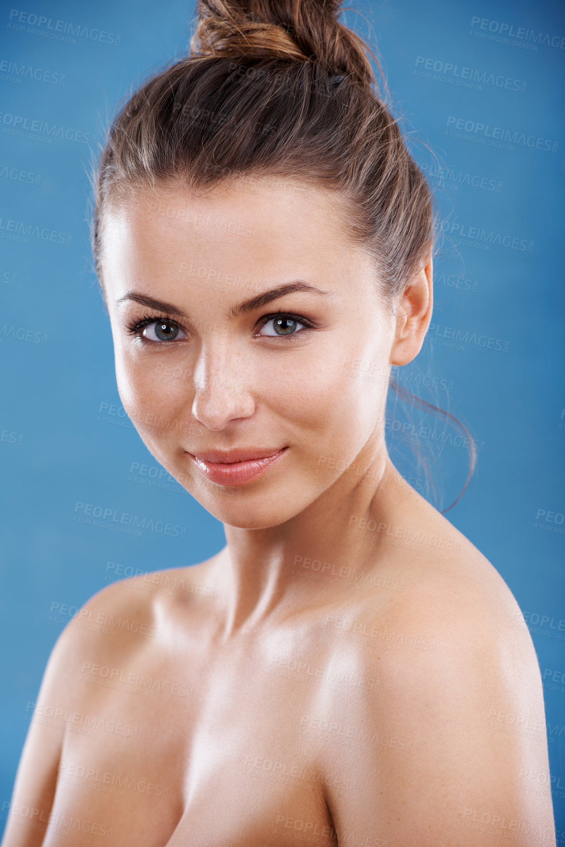 Buy stock photo Skincare, portrait and woman with natural beauty, wellness or freckles on blue studio background. Face, confident or young model with cosmetics for dermatology, acne treatment or pigmentation results