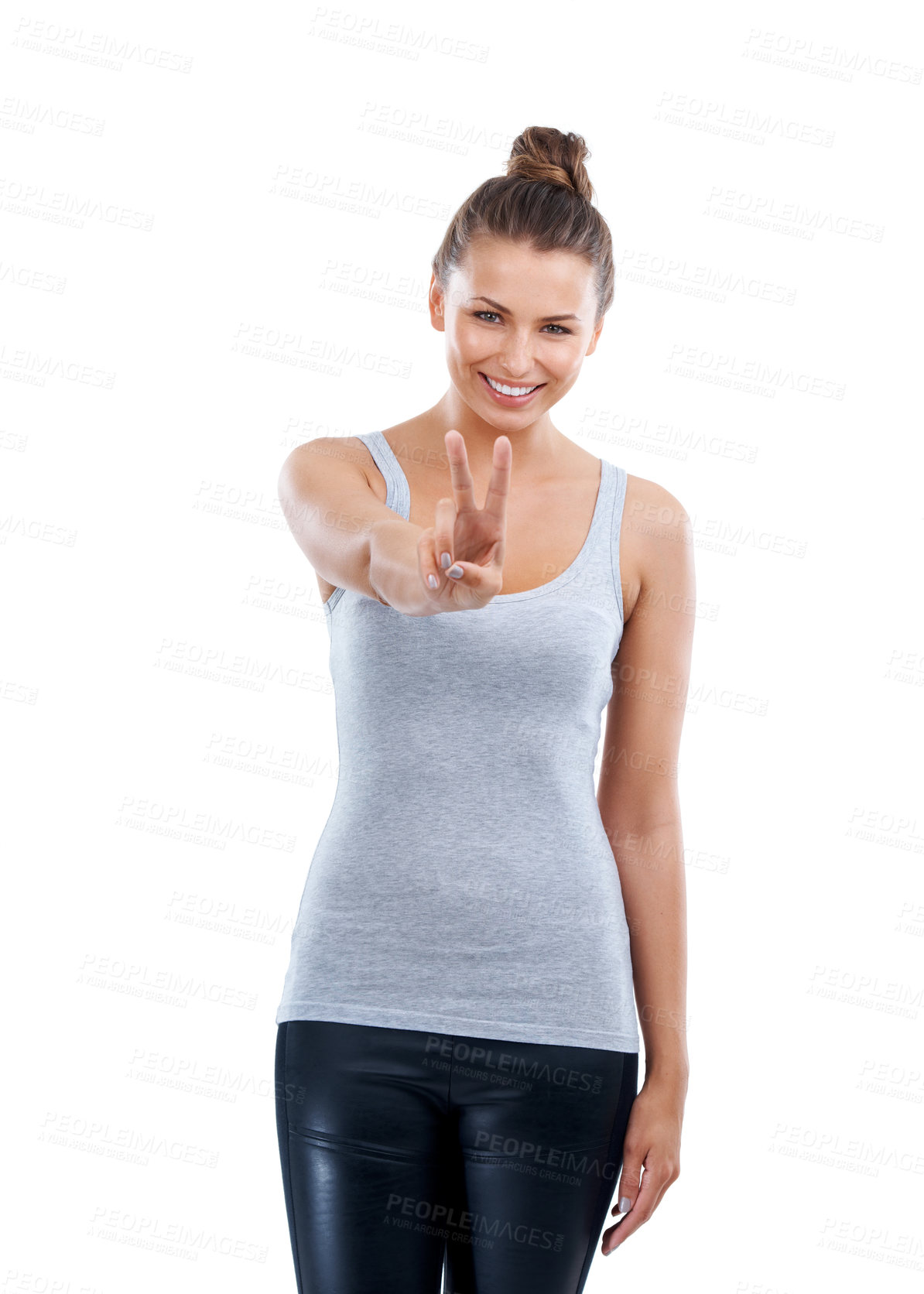 Buy stock photo Trendy young woman giving a peace gesture against a white background