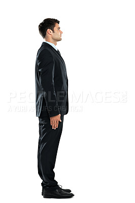 Buy stock photo Serious, successful and young businessman standing isolated on a white background in a studio. Side profile, confident and office worker in a suit for work on a studio background with mockup space
