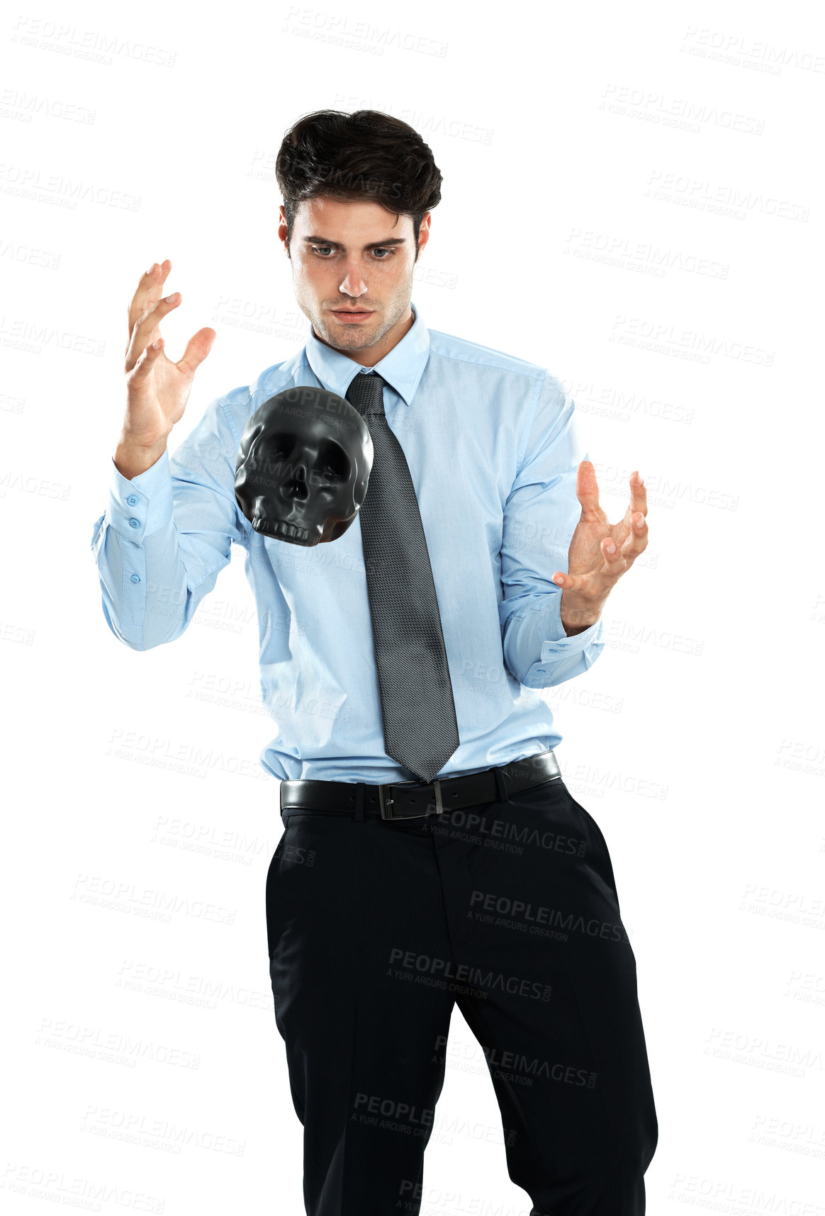 Buy stock photo Business man, levitation and black skull in studio isolated on a white background. Magician, spirit and male employee levitating head or scalp in air for evil, death or occult, voodoo or magic trick.