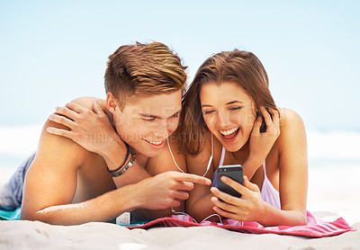 Buy stock photo Phone, sand and couple of friends on beach for holiday news, vacation sale and summer competition. Winning, wow and excited winner, woman and partner by tropical ocean on mobile or social media chat 