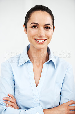 Buy stock photo Attractive businesswoman smiling while standing against a white background
