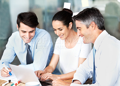 Buy stock photo Team, business people and laptop in office for planning, collaboration and discussion. Men and a woman together at a desk with tech for corporate research, brainstorming ideas or marketing strategy