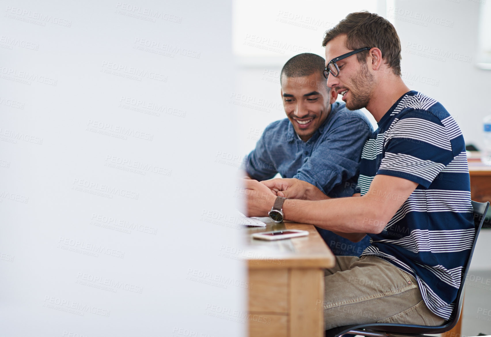 Buy stock photo Men, people and happy in office with conversation or discussion for project as graphic designer. Business, employees  and smile or satisfied with chat for meeting, brainstorming and teamwork