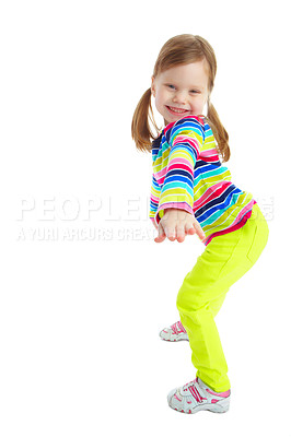 Buy stock photo Full length portrait of a playful little girl smiling while isolated against a white background