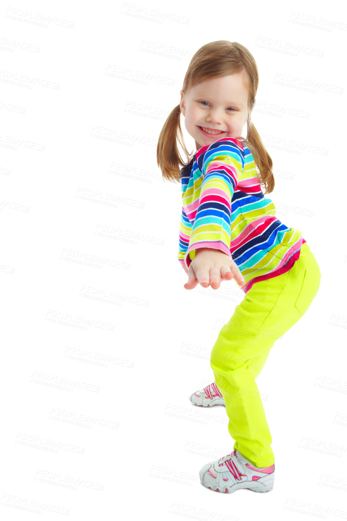 Buy stock photo Full length portrait of a playful little girl smiling while isolated against a white background