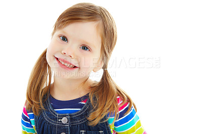 Buy stock photo Portrait of a little girl with pigtails smiling while isolated against a white background