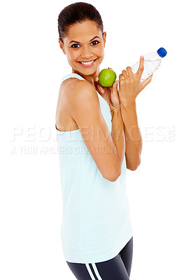 Buy stock photo Portrait of a beautiful young woman holding an apple and a bottle of water